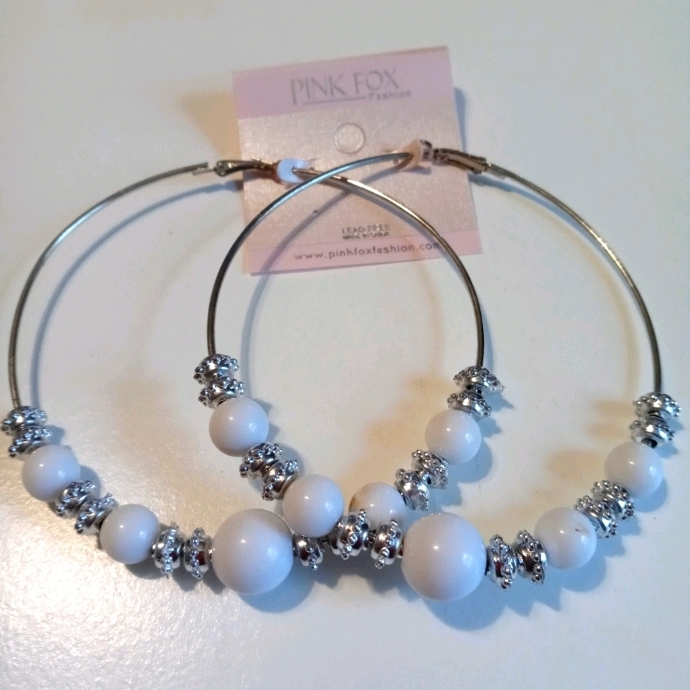 Brand new silver and white big earrings